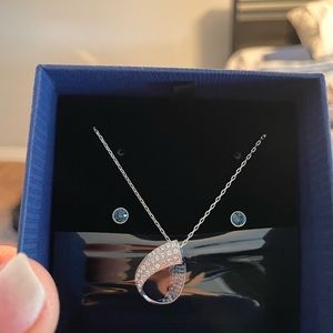 Swarovski crystal necklace and earring set. Never worn. Retails for 129.00